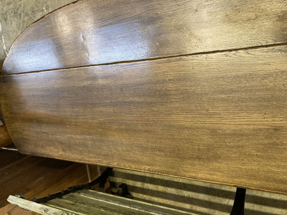 A reproduction oak drop flap coffee table, width 150cm, depth 45cm, height 43cm